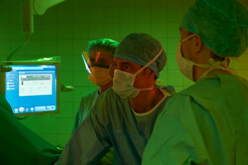 Surgeons doing a procedure in ergonomic lighting from Chromaviso